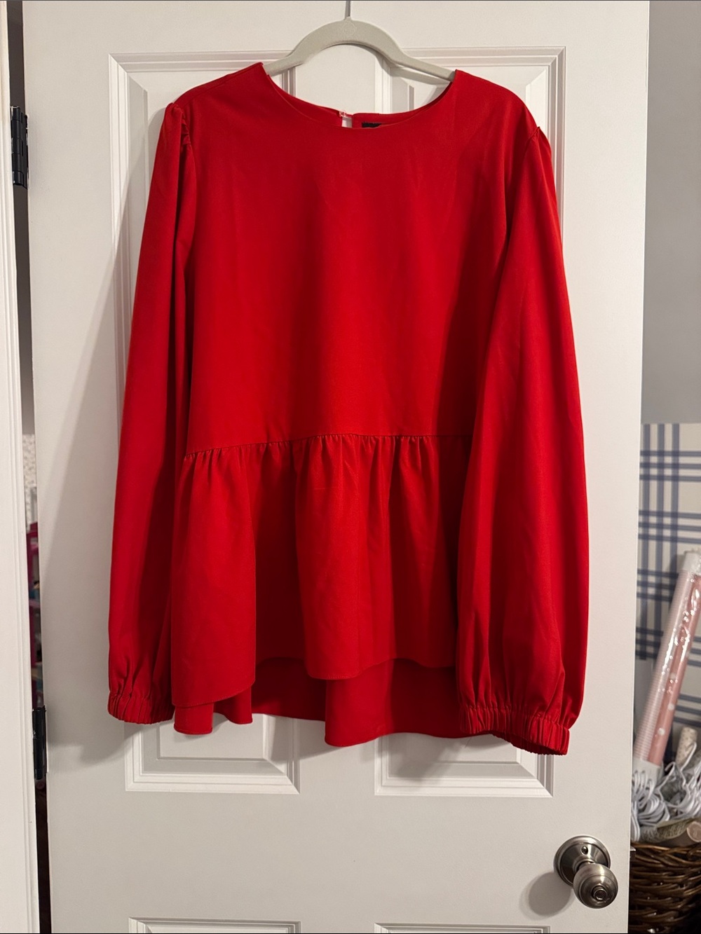 Tnuck/Pommander place Bright Red Long-Sleeve Peplum Blouse